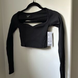 Out from under seamless twist back long sleeve women’s crop top